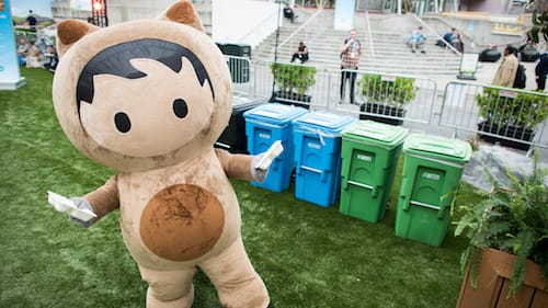 Photo of Astro with recycling bins