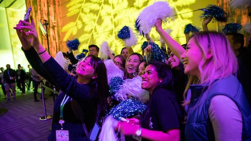Women post for a selfie photo