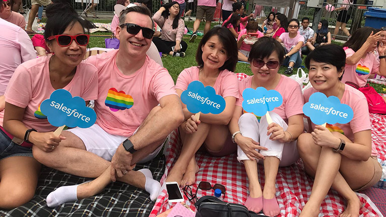 Paul with friends at a salesforce pride event