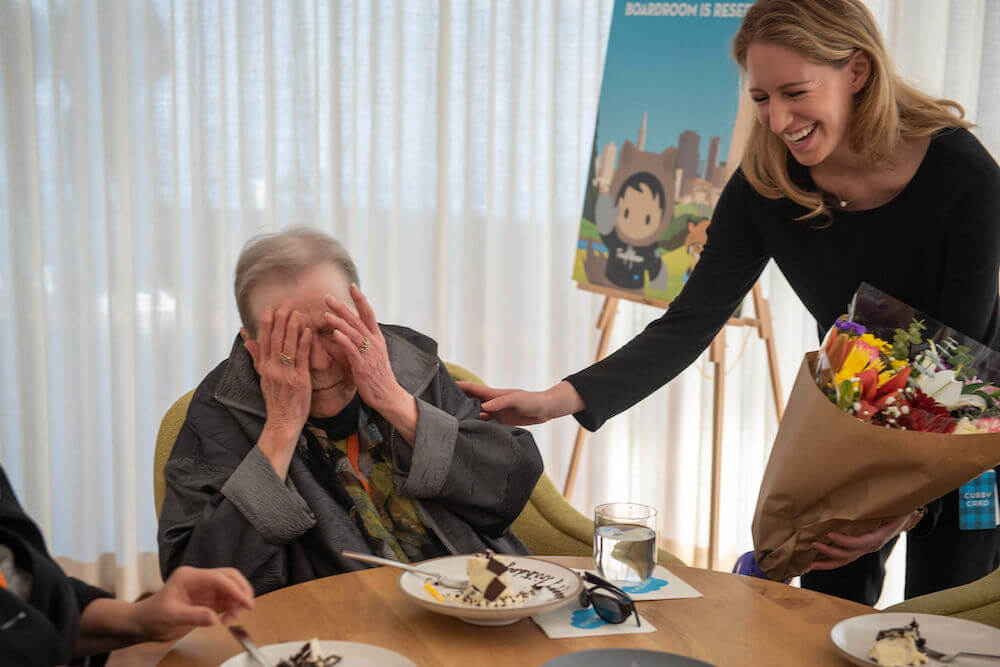 Little is given surprise cake and flowers to celebrate her 100th birthday.