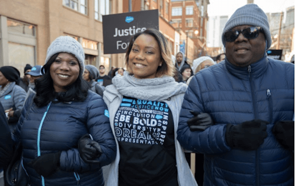 From L-R: Cindy Tyeskey-Gage, VP Executive Programs, Marketing Manager, Executive Programs and Craig Cuffie, SVP, Global Sourcing and Procurement attend the MLK March in Atlanta