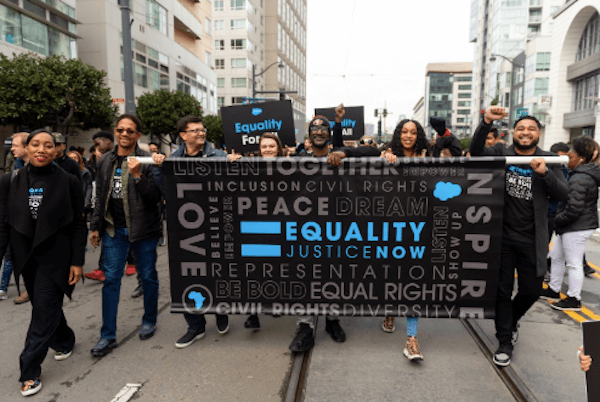 Salesforce employees march at an Equality event.
