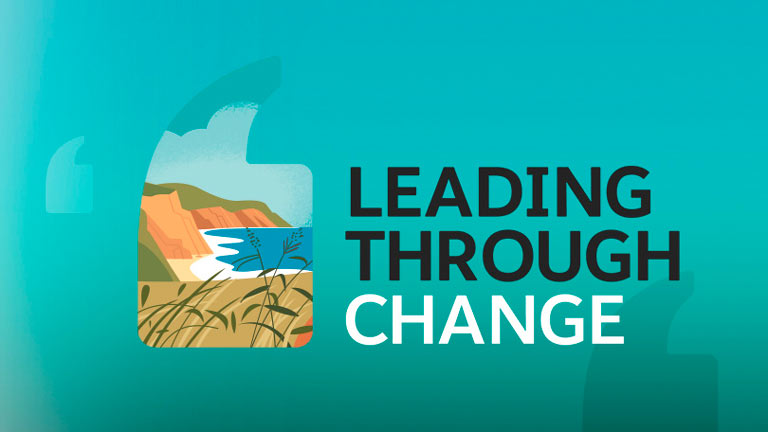Image with text that reads "Leading Through Change"