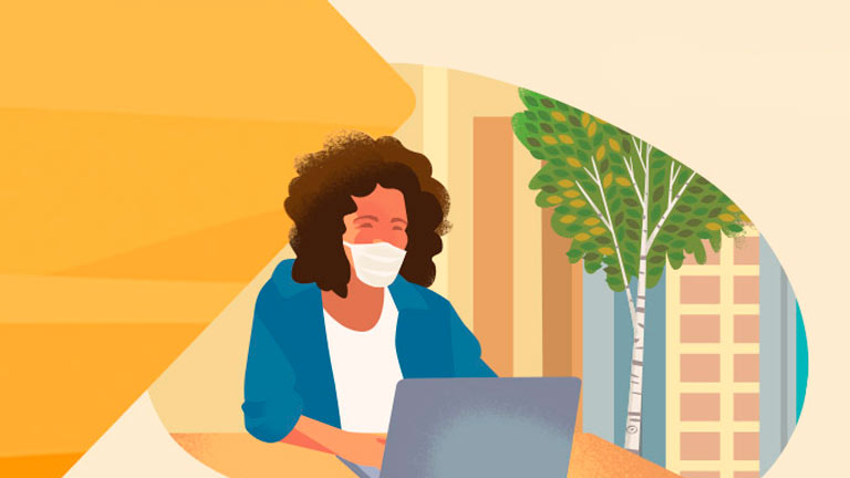 Woman wearing face mask in office
